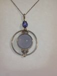 14 Kt Yellow and White Fold Tanzanite and Blue Chalcedony Pendant